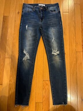 Dark wash ripped skinny jeans
